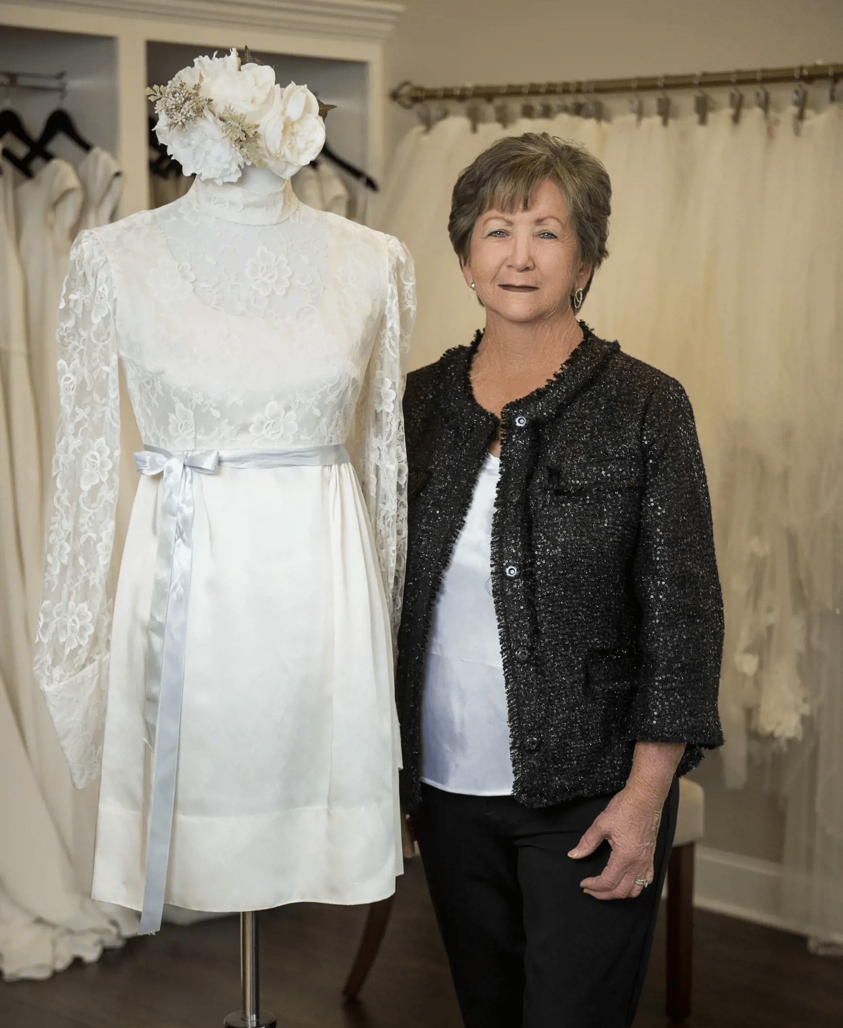 Model wearing a white gown